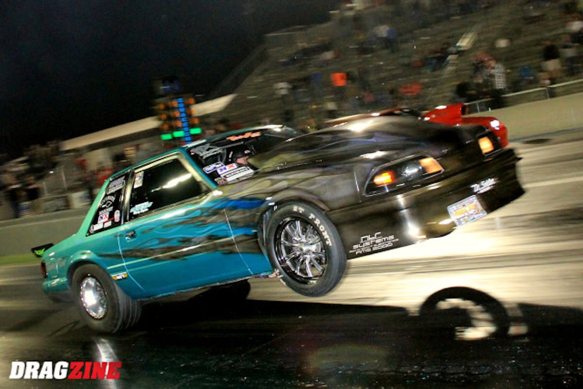 Nitrous X had thirteen cars in class with Jeff Carpenter going number one, runnign a 4.661 with his Induction Solutions equipped. 88 Mustang based out of Sweetwater, Tennessee. Troy Pirez Jr landed second with a new combination from Fast Forward Race Engines. Shawn Pevlor, Casey Smith and Matt Schlein rounded out the top five. Number eleven qualifier Zane Owen would earn the first round win over Smith and take out Schlein in round two leaving himself and the top three qualifiers left for the semi finals. Pirez and Pevlor met there with both racers on point leaving together and running side by side to the stripe where Pevlor nudged out the Seffner, Florida racer with a .041, 4.710 at 149 to Pirez' 4.727 at 146. Carpenter would put up a 4.709 at 149 to best Owens setting up the final with Pevlor who has struggled keeping his front end on the ground. In the final it would be Pevlor away by a large margin hurting his chance at a win. Pevlor would put up a 4.709 at 155  in his BES/Nitrous Outlet powered ride to earn the win over Carpenter's 4.779 at 148 MPH.