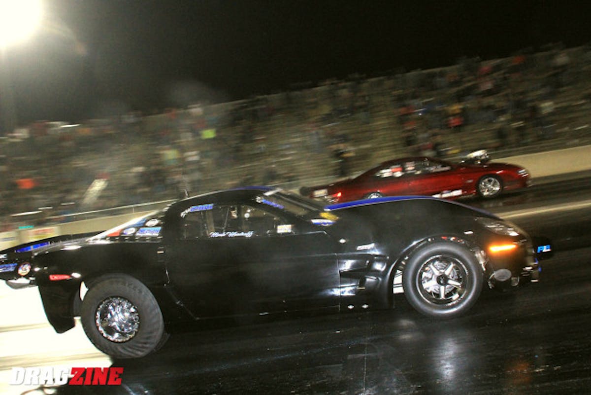 A bit of controversy ensued after Steve Jackson's crash in the quarter finals at the scales with some voicing complaints he was even allowed to cross them at all after bumping the wall. The end results is he was and faced off with Mark Woodruff in the semi finals where Woodruff took a hole shot start and running a 4.05 at just 167 MPH and Jackson having trouble and skipping the tires and moving left out of the groove and was quick pulling the chutes to get the car straightened though his crazy day was over. The other pair left in was Tim Slavens and Joe Albrecht with the two having very close reaction times.  Slavens put some power in it scoring a 3.90 at 206 for his efforts, it just wasn't enough to keep Albrecht at bay with  the New York based racer running a 3.845 at 201 MPH to set up the final. Mark Woodruff and Joe Albrecht in the final round.