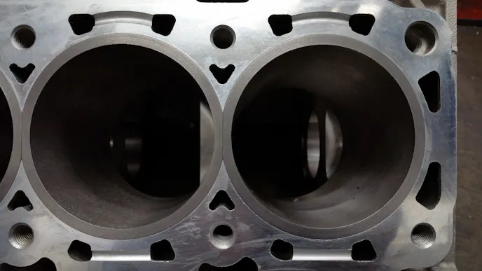 Bear Block Motors opted for conventional flanged cylinder sleeves in its new aluminum Coyote block. The sleeves are much thicker than stock and unlike the cast-in-place Coyote sleeves, are simple to replace.