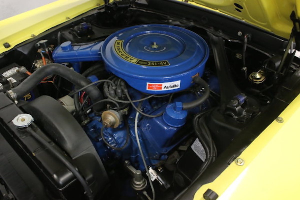 Power for the big cat comes from a 351 Cleveland V8, which was rebuilt just 2000 miles ago. A correct intake and big Holley 4-barrel carburetor gives the engine bay the proper 1970 look under that big air cleaner, which has been augmented with reproduction decals.
