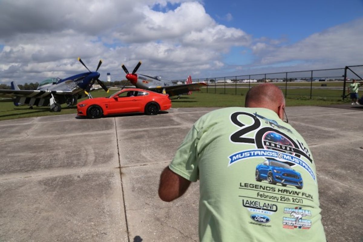 One of the most popular aspects of the Mustangs & Mustangs show is the opportunity for show participants to have their vehicles photographed with P-51 Mustang aircraft. The club brought these planes in just for the show.