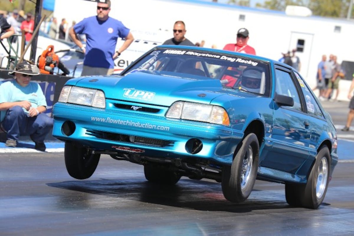 You are looking at the quickest Coyote Stock race car so far after Darin Hendricks rocketed his Cobra to the top of the qualifying ladder last night with a 10.07 at 134 mph to take the top spot so far. In the second round today he ran in the teens, so we’ll see what he can do in the cooler air later.