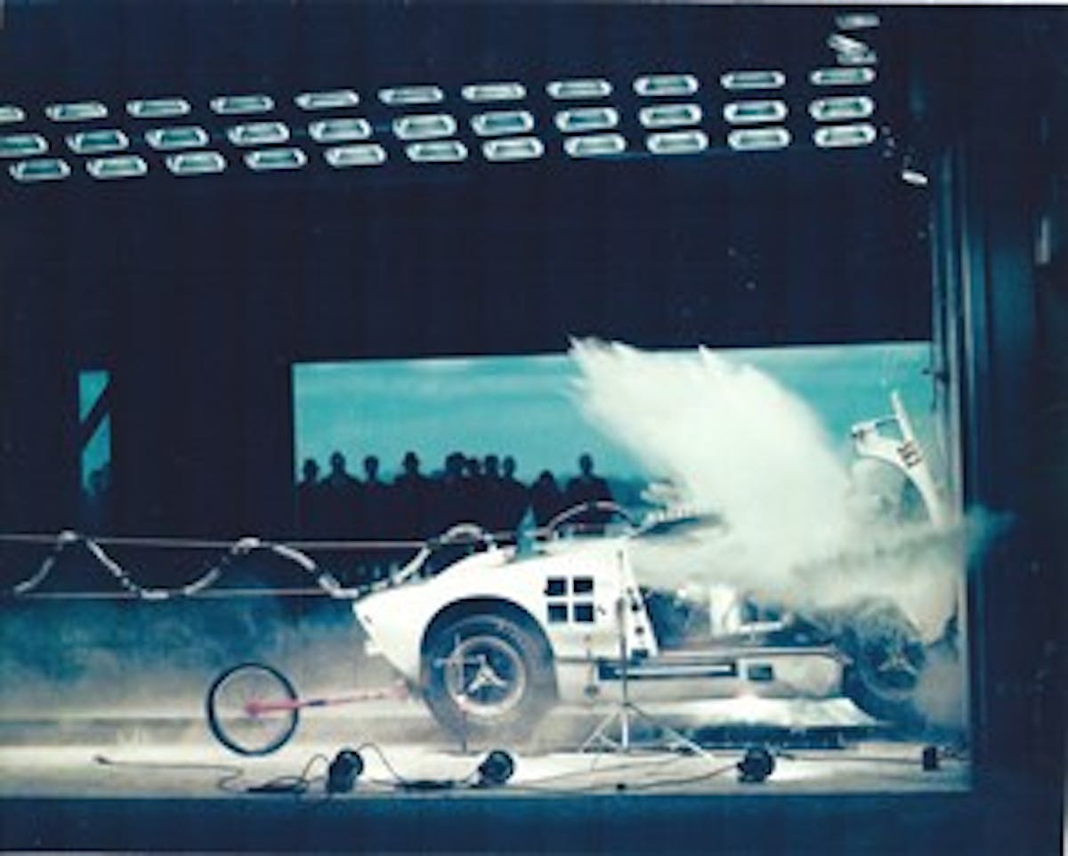 The end of a GT 40 Mk II. Painful to look at but, hopefully, usable information was gathered. The explosion of coolant makes it hard to see all the action. The hood panel is flying off toward the upper right. The front wheels are several inches off the ground. No test summaries are available. (Photo Courtesy Randy Hernandez Collection)