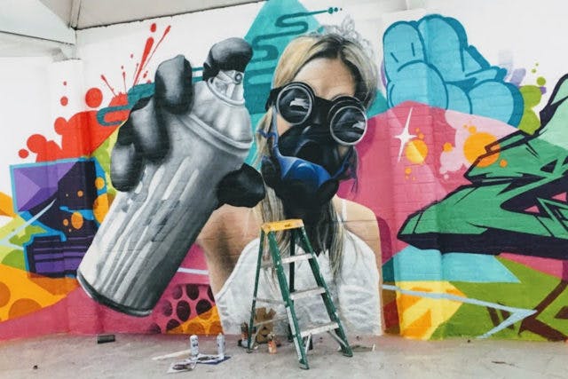 Fortunately the artists didn’t tag the Ford GT. Rather they simply used the white GT as a contrast to the colorful arts sprayed on the studio wall.