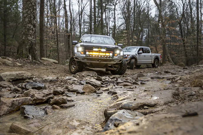 Can a Ford Raptor rock crawl? Nate Shirley (front) and Billy Weaver (rear) attempting to prove that they can.