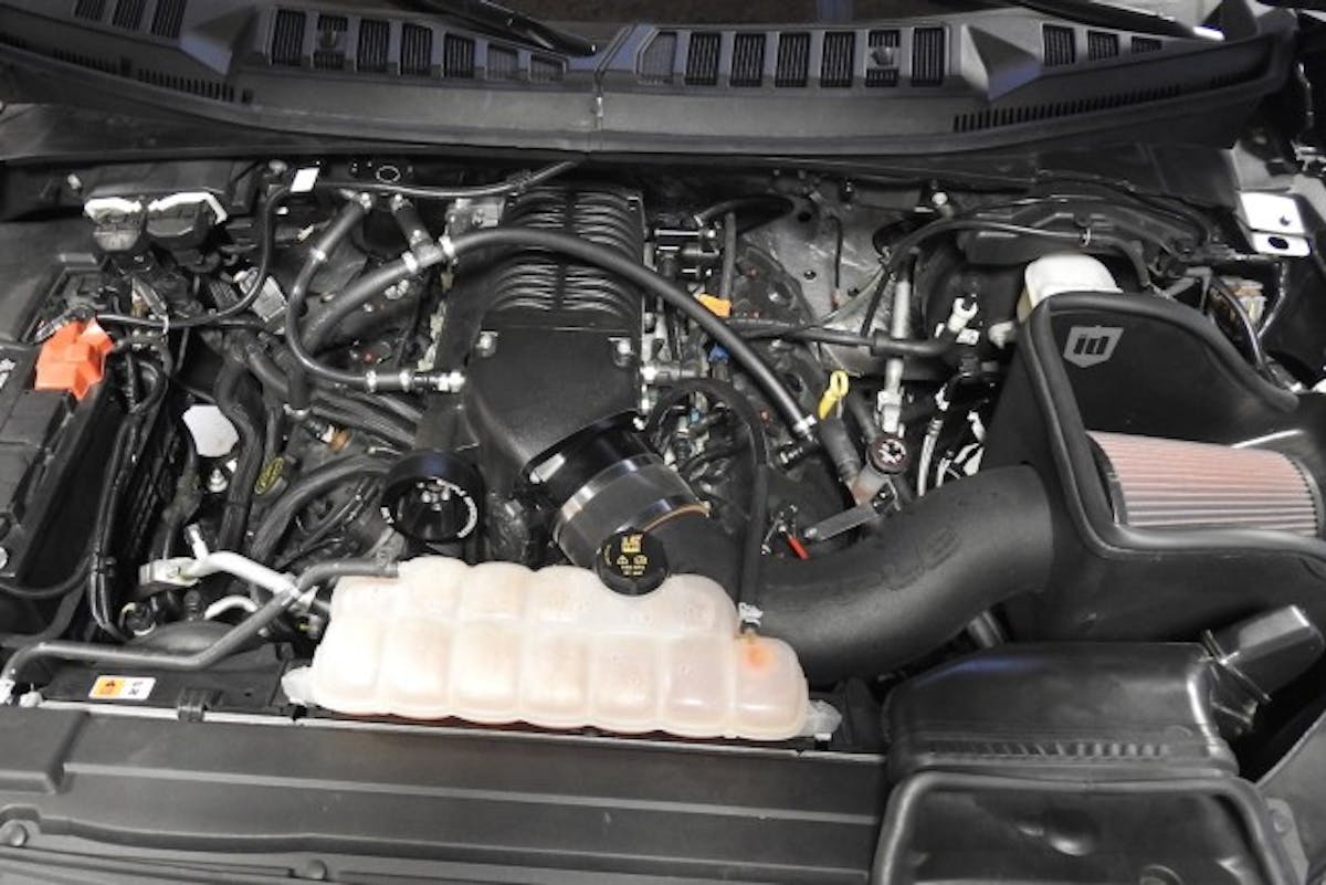 The Whipple 2015-2016 Ford F-150 supercharger system looks right at home atop the Coyote engine in the ID Motorsports project truck.