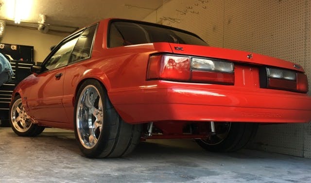 Even the massive drag radials out back might have trouble containing four-digit horsepower, but they sure look great on those Boze forged billet wheels. Other than a simple cowl hood up front, this Fox retains the timelessly clean coupe lines.