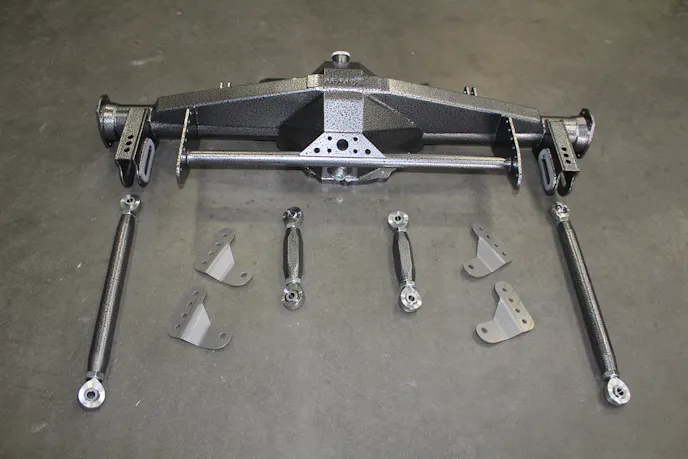 The complete Team Z Fab 9 housing assembly, including the upper and lower control arms and shock mount brackets. This is Team Z's all-out race offering and has been into the three-second zone on Brad Edwards's radial tire Mustang.
