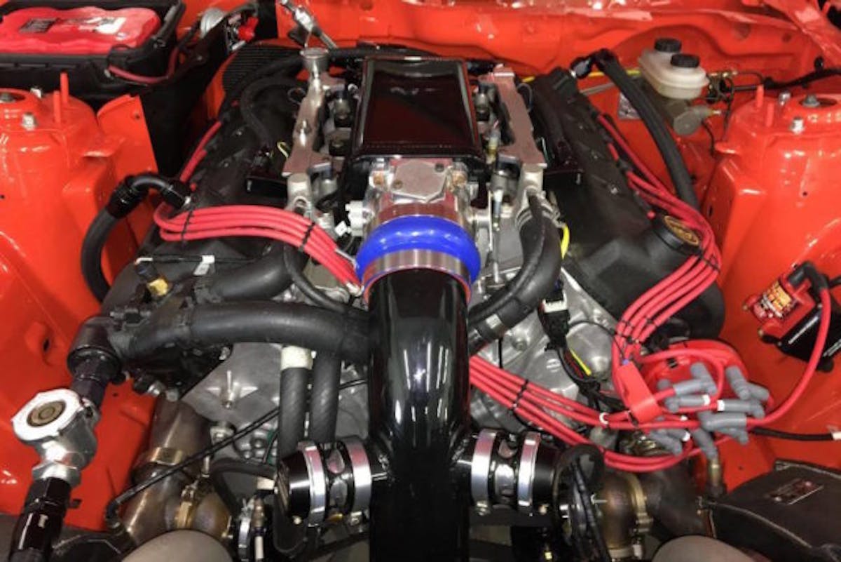 No need to scratch your head. That is not a Coyote under the hood of Jordan’s S550. Instead, Jordan and Chad from London Chassis Dyno opted for a tried and true Trinity 5.8-liter engine built by Bischoff Engine Service and boosted by two 76mm Borg-Warner turbos.