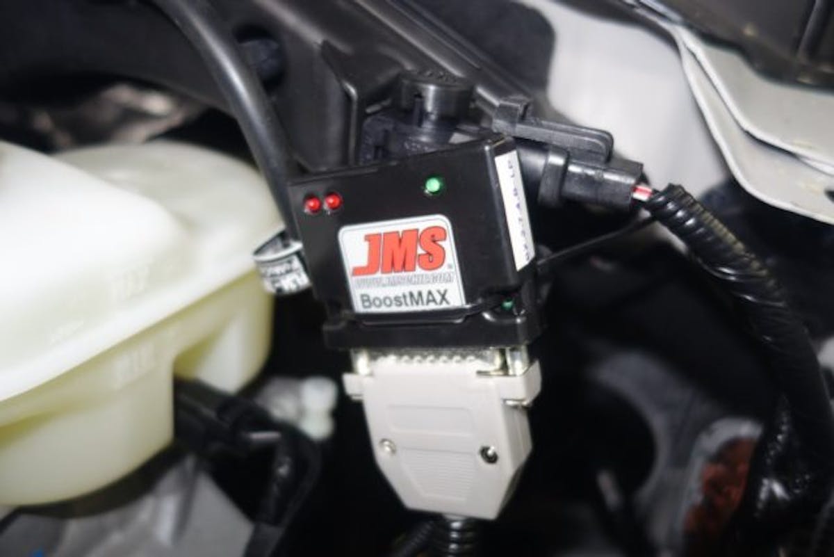 You can mount the BoostMax anywhere in the engine compartment, but for the purposes of showing for our cameras, Rick mounted it in plain sight. You could hide it so people think it’s still stock.