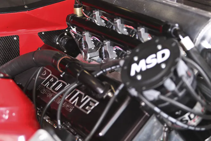 The engine management is done using a Fueltech FT500. Copious amounts of methanol is introduced to the engine via 16 Billet Atomizer 3 injectors. The injectors are nessled comfortable in the runners of a custom billet intake manifold.