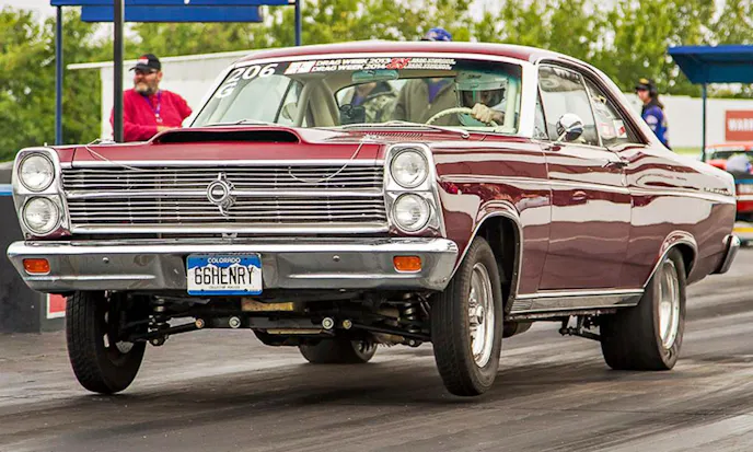 Takeoff! Armstrong launches his '66 Fairlane during drag week.