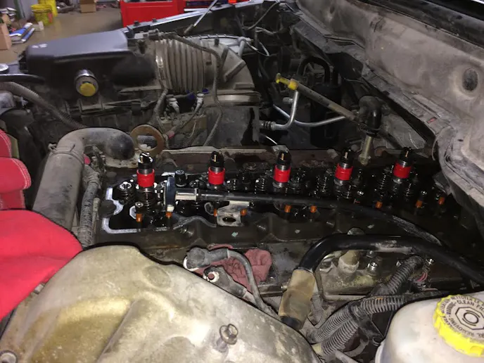 If you aren't comfortable installing your new injectors, utilize the full service department that Scheid Diesel offers! Shown is a Red Top Install on a customers common rail cummins!