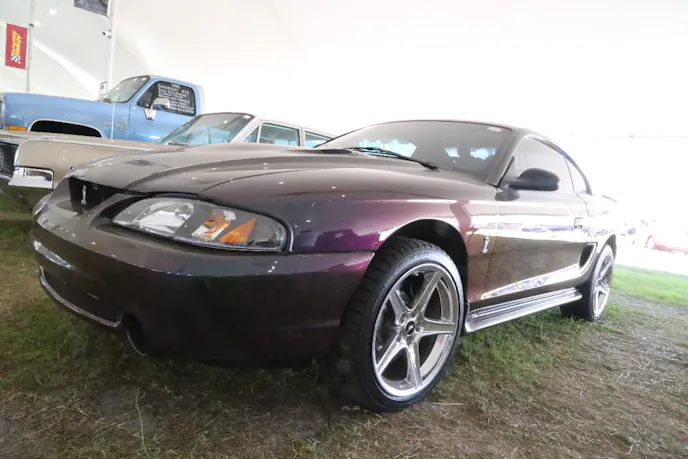 As fans of more modern Ford performance vehicles, we have always enjoyed the special variants that Ford produced. In the day, the 1996 Mustang with Mystic paint was a rare and desirable machine. This one had a over 40,000 miles on the odo and an accident on its record, so it sold for only $6,600.