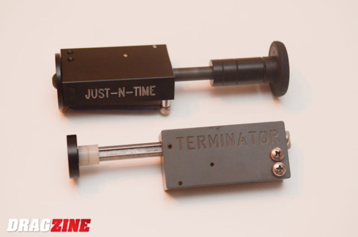 The Just-N-Time button from CollectorTethers.com (top) and the tried-and-true Terminator button from Biondo Racing Products.