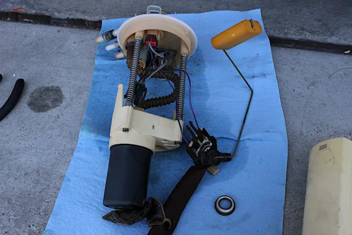 The upper portion of the fuel sender separated from the bucket