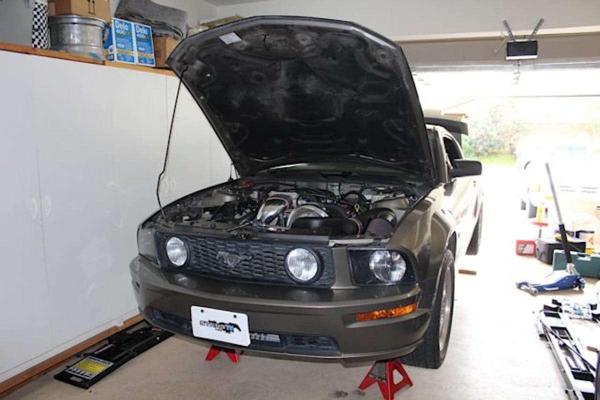 Yes, that is our Paxton supercharged Mustang in a home garage, on jack stands for this install.