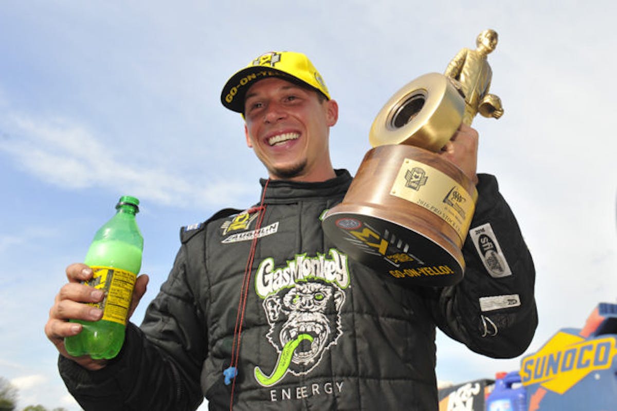Laughlin celebrating his first career NHRA Pro Stock victory last September in St. Louis. Photo courtesy NHRA/National Dragster