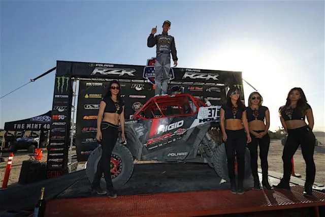 RJ Anderson atop is Polaris RZR after taking home the win in the short-course race.