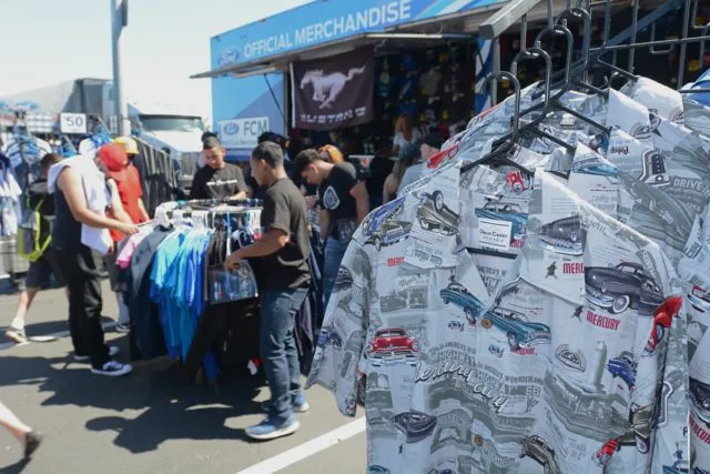 For ages commercial activity was streng verboten at Fab Fords, but then word came from the crowd that after a couple of hours of looking at cars they might want a diversion, so various vendors have been invited in. They range from local Ford dealers promoting boom trucks and service vans—which we must say really don’t fit the show—to customizers and SEMA regulars hawking superchargers, brakes and the like. But as always, the most popular seem to be the shirt-and-cap tractor trailers. 