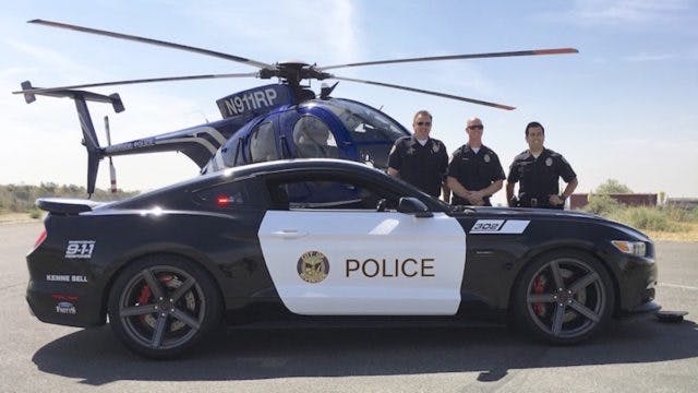 Ryan Railsback, Andy Cook, and Aurelio Melendrez of the Riverside Police Department were all smiles when the supercharged ’Stang arrived. (Photo Credit: Saleen)