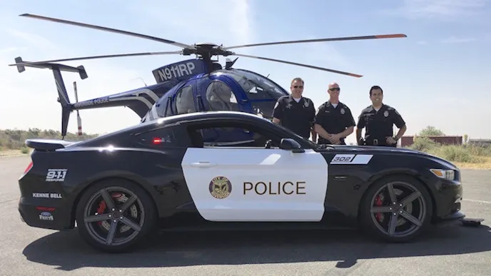 Ryan Railsback, Andy Cook, and Aurelio Melendrez of the Riverside Police Department were all smiles when the supercharged ’Stang arrived. (Photo Credit: Saleen)