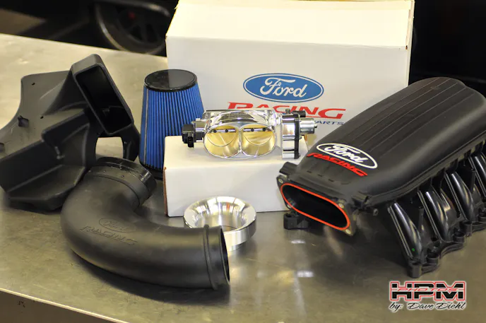 The Cobra Jet intake manifold is designed to bolster top end power without sacrificing low end torque in the process. And since the factory intake tube isn't compatible with this intake, Ford offers a matching Cobra Jet cold air intake as well, which is based off the intake used in the naturally aspirated Cobra Jet drag car. 