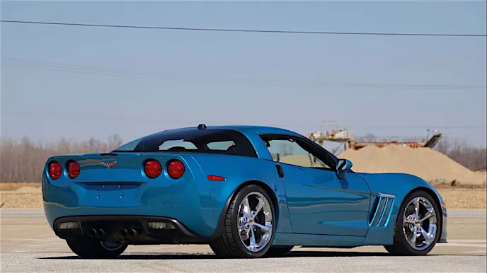 Lot #W120 2005 Corvette Titled as rebuilt vehicle LS2/400 HP V-8 engine 6-speed manual transmission Dual Zone climate control 4-wheel disc brakes Loaded with power options Black leather interior 46,270 believed-original miles Updated with 2010 Grand Sport styling and wheels