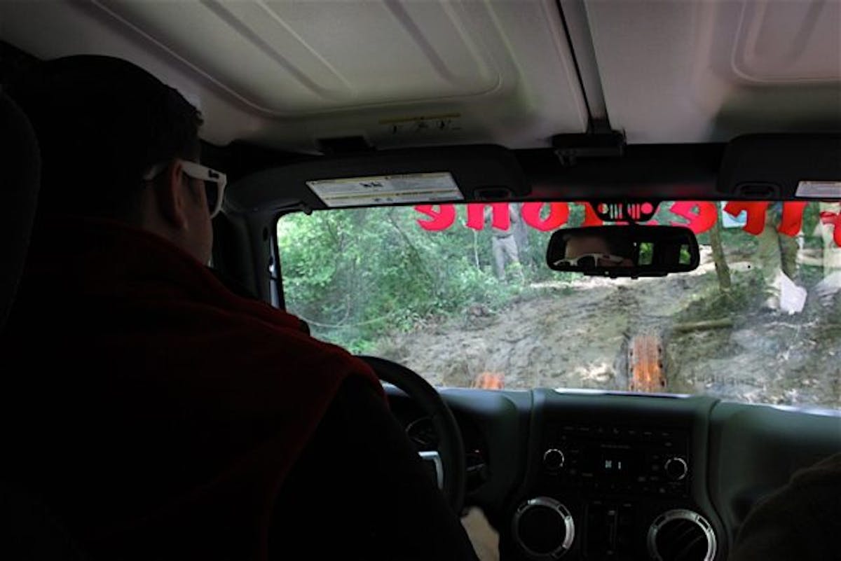 Here was the first water crossing ditch I had to conquer. Note the MaxTrax just up ahead; definitely not my idea of free-wheel off-roading, but they helped prevent the Jeep from getting stuck.