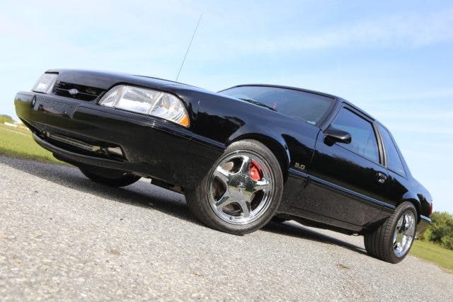 Having owned this car since it was new, Jack was ready to freshen it up in 2015 when it turned 25 years old. He turned to Steve Harper, of C&H Motorsports in Sanford, Florida, to paint the formerly Oxford White coupe in a sleek black finish, which is accented by those timeless Pony R five-spoke replica wheels.