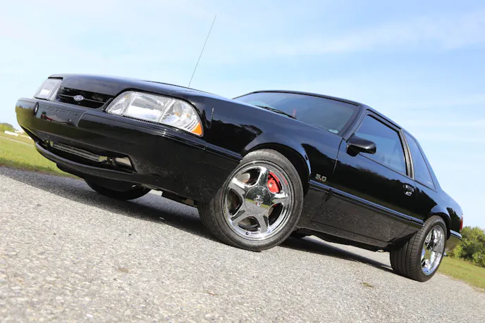 Having owned this car since it was new, Jack was ready to freshen it up in 2015 when it turned 25 years old. He turned to Steve Harper, of C&H Motorsports in Sanford, Florida, to paint the formerly Oxford White coupe in a sleek black finish, which is accented by those timeless Pony R five-spoke replica wheels.