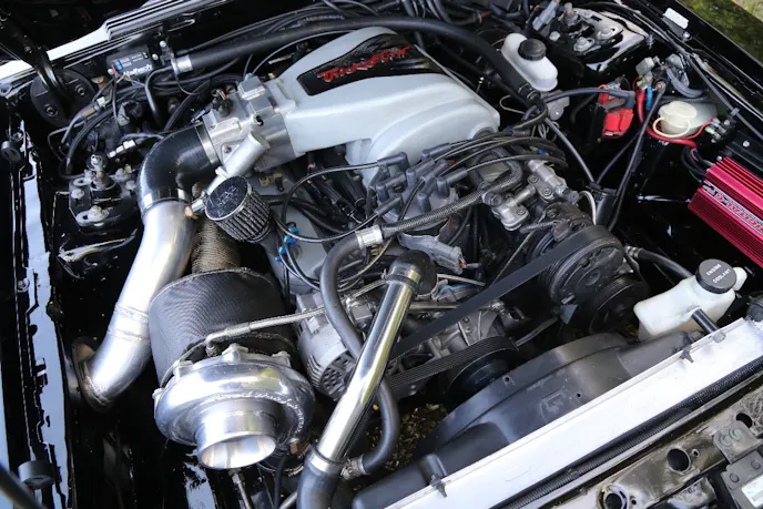 “Everything is as you would probably find in a X275 car that runs 8-second quarter miles, but it’s in a street car that looks like this, which is what makes it cool,” Jack said of the 363-cube, turbocharged Windsor that powers his Fox sleeper.