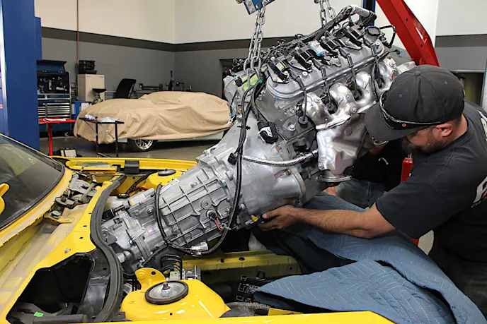 Once the manual transmission conversion was complete, we slid in the LS7 and Tremec TR6060.