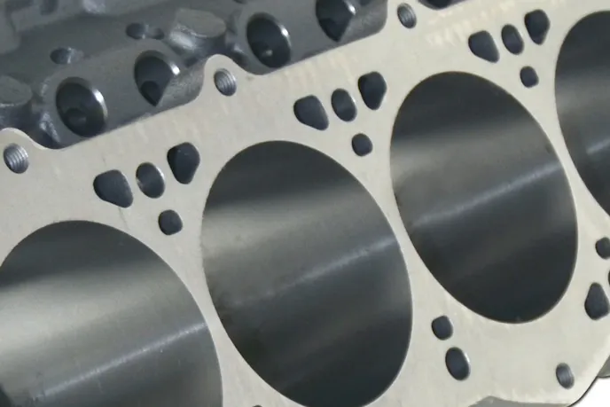 The 7/16-inch head bolt holes are set well below the deck surface and blind tapped to reduce the chance for water leaks. Moreover, there are two additional bolt holes to take advantage of the additional sealing available from heads feature six bolts per cylinder.