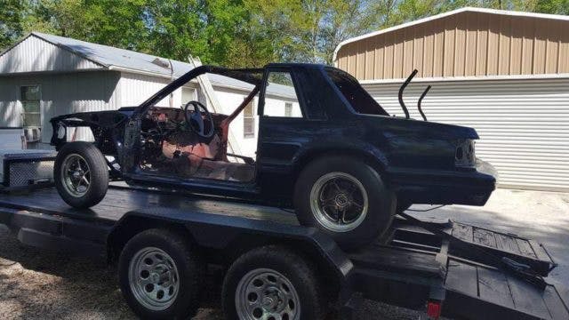 After dropping a Coyote engine into the coupe's engine bay, Larry built his own custom single turbocharger kit, paired with a spare Powerglide automatic transmission and a PTC converter. After dabbling with a Holley EFI system, Larry had the car up and running as a shell.