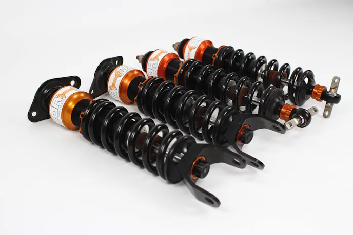 Our dampers, post-rebuild. You'd have to look pretty hard to tell they weren't brand new.