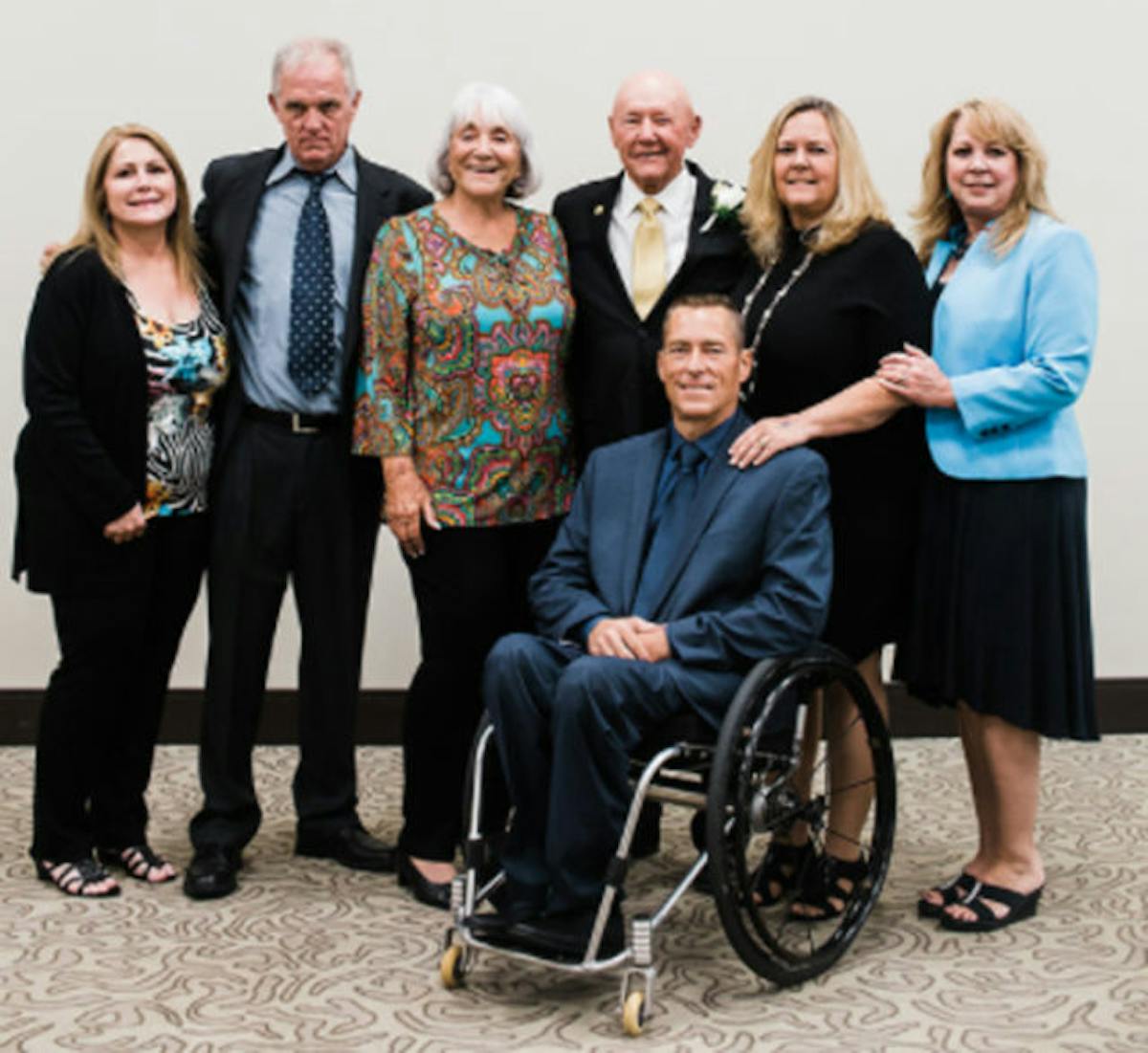 Walker Evans and his family during the ADA ceremony.