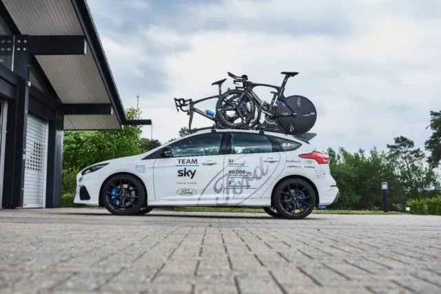 One of 25 Ford support vehicles deployed by Team Sky, this 2017 Focus RS Option Pack features a Team Sky livery, a bike rack, custom Recaro seats, and more.