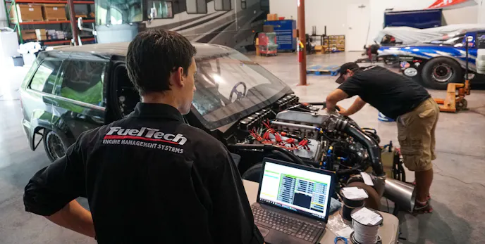 The FuelTech FT500 system being wired, installed, and programmed at Pro Line Racing.