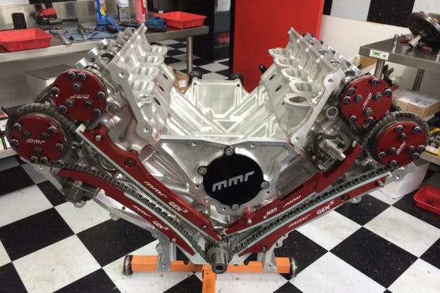Since there is really no better option and cast heads are require by the rules, Jon runs Shelby GT350 cylinder heads atop his billet Gen X engine. They are fitted with custom COMP camshafts. “We worked with COMP Cams on all the camshaft grinds and the duration numbers were the main topic of discussion between MMR and I because this was the first engine for what we do, so we wanted a safe bet as far as the camshaft duration goes,” John explained. “It is specific cam for the GT350 head, so it has a larger lift than the Coyote cams. It is the new generation of camshafts from COMP, so we are basically experimenting with different profiles and trying to give feedback. However, the GT350 is the nicest head that they’ve build, so it has the lighter rockers and high-rpm capability.”