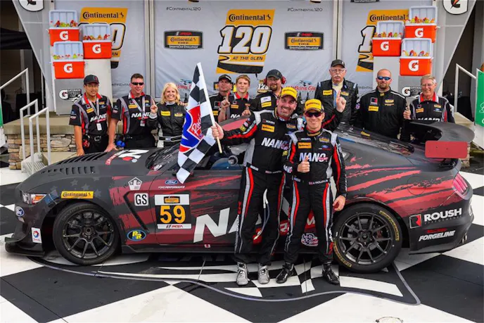 Dean Martin and co-driver Jack Roush Jr. put the No. 59 NANO ProMT Ford Mustang at the top of the Continental Tire 120 podium at Watkins Glen International.