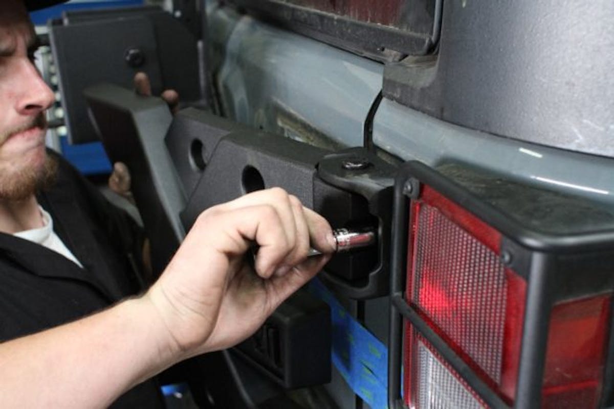 Bolt the new HD Hinge casting to the body tub first, using the factory Torx head bolts.