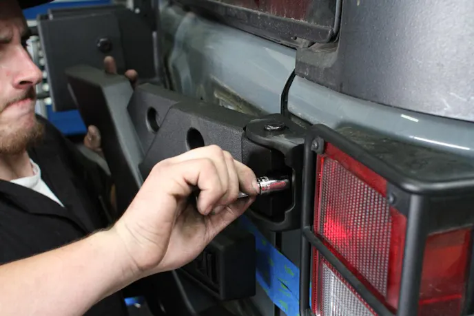 Bolt the new HD Hinge casting to the body tub first, using the factory Torx head bolts.