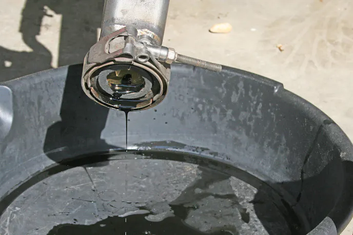 photo of old EGR cooler leaking coolant out the exhaust cavity.