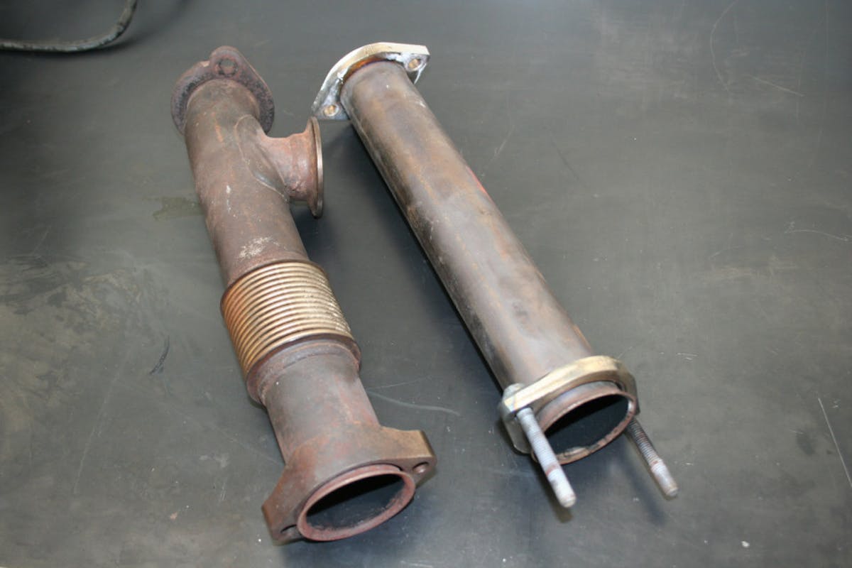 photo comparing up pipes for an EGR cooler and without