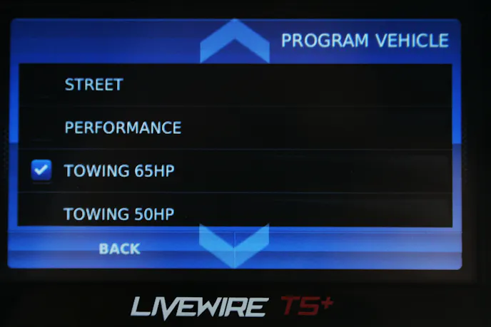 SCT Livewire TS+ monitor screen showing the four tune options: street, performance, tow 65 hp and tow 50 hp