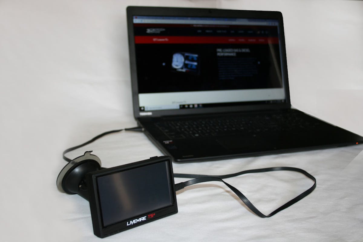 Image shows the SCT Livewire TS+ monitor plugged into a laptop