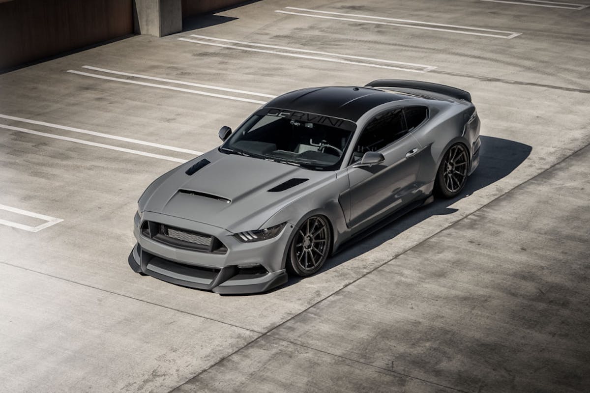 Shadows of the gloss grey exterior complement the aftermarket accents, including the Cervinis hood, carbon mirrors and custom headlamps.