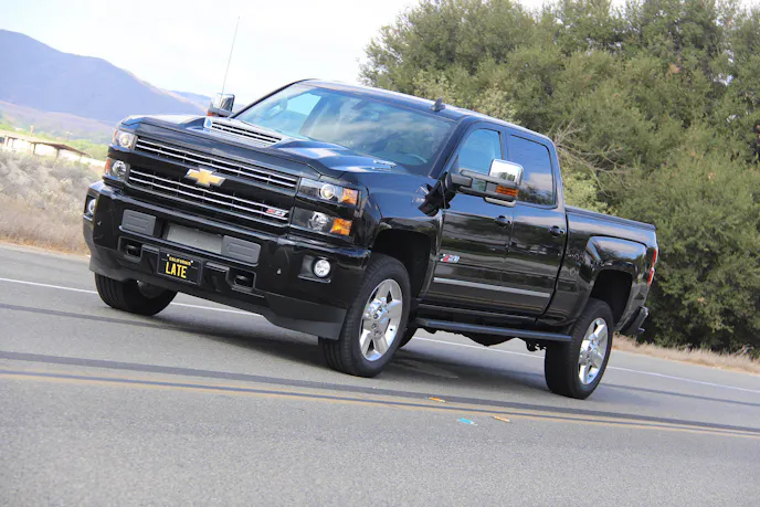 Chevy truck driving on road