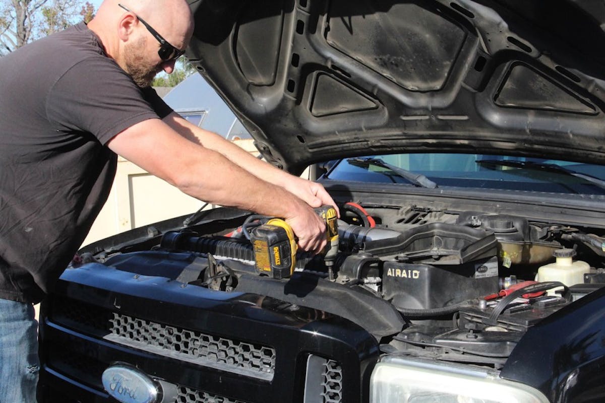 image of upper radiator brackets being removed